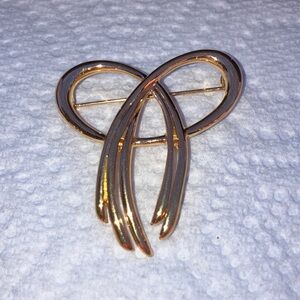 Trifari Gold Tone Ribbon Brooch